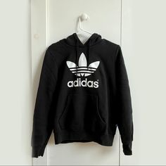 Black Adidas Logo Hoodie! Pre-Loved & In Brand New/Perfect Condition Adidas Sweatshirt With Letter Print For Streetwear, Adidas Black Hoodie For Streetwear, Adidas Hoodie Sweatshirt For Streetwear, Adidas Black Hoodie With Drawstring Hood, Adidas Black Sweatshirt With Drawstring Hood, Adidas Black Hoodie With Ribbed Cuffs, Black Adidas Hoodie With Ribbed Cuffs, Adidas Logo Print Winter Hoodie, Adidas Black Letter Print Sweatshirt