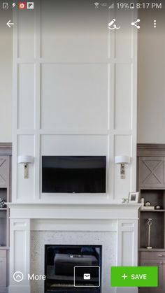 a living room filled with furniture and a flat screen tv mounted above a fire place