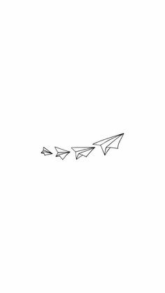 three paper airplanes are flying in the sky, one is drawn with black ink on white paper