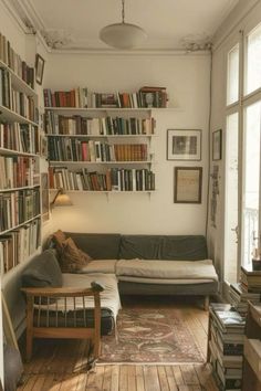 a living room filled with lots of books