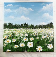 a painting of white daisies in a green field