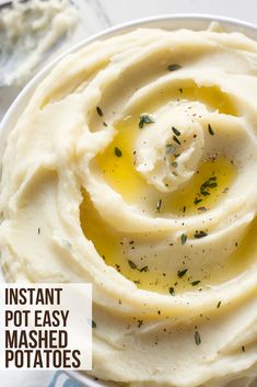 mashed potatoes with butter and herbs in a white bowl