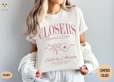 a woman wearing a t - shirt that says closer to love