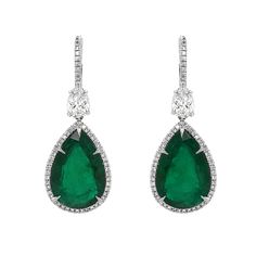 Handcrafted drop dangling platinum earrings with large pear cut green emeralds 26.82 ct in total from Zambia. Green emerald stones are Certified. Pear cut white diamonds are 0.68 ct in total. Smaller accent round diamonds are 2.0 ct in total. Diamonds are all natural and white in G-H Color Clarity VS. Lever back earrings. Width: 1.5 cm Height: 4.5 cm Weight: 17.5 g Emerald Earrings Drop, Diamond Chandelier, Platinum Earrings, Instagram Jewelry, Jewelry Diamonds, Platinum Diamond Rings, Platinum Wedding, Platinum Jewelry, 18k Gold Jewelry