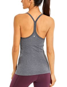 PRICES MAY VARY. Designed for low-impact workouts. Seamless collection: chafe-free, breathable, moisture-wick and four-way stretch. Slim fit, hip length. Smooth spaghetti strap racerback design allows natural range of motion. Built in shelf bra with removable pads provides light support and coverage. Seamless collection of soft, chafe-free fabric stretches with your every move. It's one of the top collections of CRZ YOGA. Designed for low-impact workouts, gives you better workout. Yoga tank top Fitness Tank Top, Floral Camo, Crz Yoga, Lounge Outfit, Strappy Sports Bras, Yoga Tank Tops, Workout Tank Top, Pink Leopard Print, Low Impact Workout