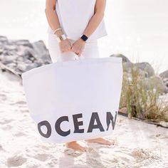 Escape in style with this oversized canvas tote! The heavyweight canvas with waterproof laminated lining provides a clean, modern look offered in a simplistic design that you can carry anywhere; the perfect getaway for the ocean! Material: Bleached White 20oz Canvas/Waterproof Size: 18" W X 20" H Care Instructions: Wipe Clean with Damp Cloth Simplistic Design, Ocean Lover, Clean Modern, Canvas Tote, The Ocean, In Style, Cleaning Wipes, Creative Design, Ted Baker Icon Bag