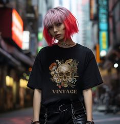 ✨Shop the latest deals, straight from small shops✨Unleash your dark side with our Gothic Floral Skull T-Shirt for Women. This softstyle ladies' tee combines the elegance of floral designs with the edginess of skull imagery, making it a standout piece in any wardrobe. Perfect for those who appreciate dark aesthetics and gothic fashion, this t-shirt is a must-have for expressing your unique style. Key Features: Soft and Comfortable: Made from high-quality, softstyle fabric, this tee offers all-day Edgy T-shirt With Front Print For Alternative Fashion, Edgy Skull Print T-shirt For Alternative Fashion, Edgy Skull Print Crew Neck T-shirt, Punk Skull T-shirt For Summer, Summer Punk Skull T-shirt, Summer Punk T-shirt With Skull Design, Edgy Tops With Front Print For Alternative Fashion, Summer Skull Print T-shirt For Alternative Fashion, Skull Print T-shirt For Summer Alternative Fashion