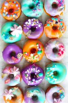 there are many donuts with different designs on them