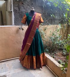 Wedding lehenga choli/ lehenga set with dupatta / teens lehenga/ bridal lehenga/ kids lehenga / narayanpet lehenga / crop top lehenga/ lehenga USA / Langa voni / voggish / green purple lehenga / pattu pavadai Here is a beautiful and traditional Indian pattu narayanpet cotton lehenga in green color paired with purple border dupatta is a stunning piece for your upcoming parties!! It's a 3 piece set that includes skirt , can be done in other combinations and customizable !! Please contact us for en Anarkali Floor-length Choli For Traditional Ceremonies, Traditional Green Floor-length Lehenga, Semi-stitched Floor-length Anarkali Set For Traditional Ceremonies, Saree Gown For Diwali And Traditional Ceremonies, Traditional Green Floor-length Choli, Floor-length Sharara With Pallu For Traditional Ceremonies, Floor-length Gown For Navratri And Traditional Ceremonies, Traditional Gown With Pallu For Diwali, Art Silk Saree Gown With Sheer Dupatta