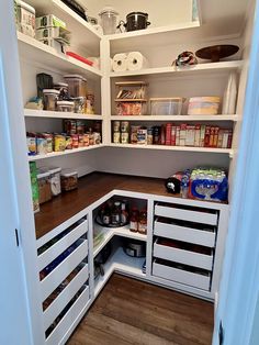 an open pantry with lots of food in it