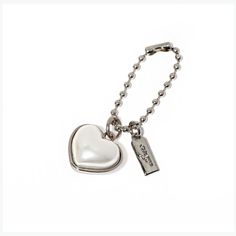 `✿' Quantity: 1 pcs `✿' Heart Color: White `✿' Heart Size: 2.3cm, as the picture shows `✿' Chain Color: Silver, Light Gold `✿' Length: 10cm `✿' Weight: 8.5g We are specializing in manufacturer all kinds of design purse frame, we can do according to you design too. ☆--------♫-----------------♫---------♫--------------♫------☆ All orders, We use special line to your destination to help avoid Custom Duty, shipping time is around 10-15 days.(dependent upon customs and the postal system). Feel free to contact us if you couldn't find what you're looking for in our store. We'll be more than happy to help you. Express shipping by DHL is also available. We will choose the best ones for you before send out. Your satisfaction is very important to me. Please contact me if you need large quantity.  Than Handbag Keychain, Silver Jewelry Png, Bag Tag, Keychains, Key Chain, Red Keychain, Metal Keychain, Heart And Key, Heart Keychain