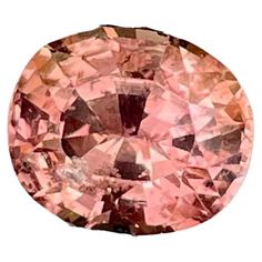 Weight: 1.98 carats Dimensions: 8x6.7x4.6 mm Clarity: SI Origin: Sri Lanka Treatment: None Shape: Oval Cut: Step Oval Cut Discover the exquisite beauty of our 1.98 carat Pinkish Peach Sapphire, a natural gemstone hailing from the renowned mines of Sri Lanka. This oval cut gem boasts a mesmerizing peachy hue, reflecting a unique blend of Pinkish Peach that captures the essence of serene willing and lush landscapes. Expertly faceted to enhance its natural brilliance, this sapphire exhibits an exce Peach Sapphire, Sapphire Stone, Oval Cut, Peace Of Mind, Sri Lanka, Loose Gemstones, Natural Gemstones, Sapphire, Essence