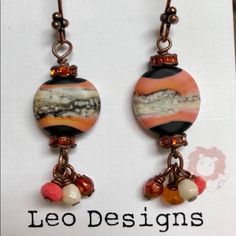 the earrings are made with glass beads