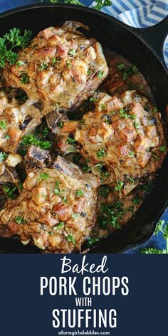 baked pork chops with stuffing in a cast iron skillet on a blue cloth