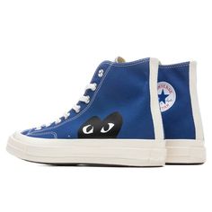 The iconic partnership of Converse and Comme Des Garçons PLAY is highlighted in their All Star Chuck ‘70 High sneaker model. The model features the iconic red heart logo designed by artist Filip Pagowski as well as a signature canvas upper and lace-up closure. Complete with a rubber toebox and outsole, the sneaker provides a long-lasting finish. CHUCK TAYLORS RUN ABOUT 1/2 SIZE LARGE, WE RECOMMEND SIZING DOWN. THIS PRODUCT DOES NOT QUALIFY FOR ANY DISCOUNTS OR SPECIAL PROMOTIONS. 12 oz cotton ca Filip Pagowski, Converse X Comme Des Garcons, Cdg Play, 2024 Wishlist, Quince Ideas, Converse Chuck 70, Model Features, High Sneakers, Comme Des Garcons Play