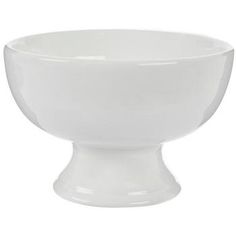 a large white bowl on a pedestal with no handles and an extended base for serving food