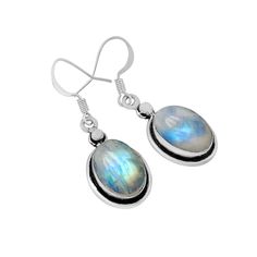 Natural Rainbow Moonstone Gemstone 925 Sterling Silver Earring Jewelry. Earring made by Natural Rainbow Moonstone Gemstone with pure 925 sterling silver. The unique design jewelry Earring has been fashioned out of 925 sterling silver and promises to be comfortable wear at all times. This Jewelry can be a perfect gift for your loved ones and one of a kind design makes this thing perfect for engagement gift, wedding gift, marriage anniversary gift and birthday gift. Rainbow Moonstone Earring, Oval Silver Gemstone Drop Earrings, Silver Moonstone Earrings For Anniversary, Silver Moonstone Gemstone Earrings, Silver Moonstone Earrings With Ear Wire, Silver Moonstone Pierced Earrings, Silver Pierced Moonstone Earrings, Sterling Silver Oval Crystal Earrings For Gift, Oval Sterling Silver Crystal Earrings For Gift, Silver Oval Sterling Silver Crystal Earrings