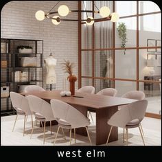 a dining room with a table and chairs in front of a bookcase filled with books