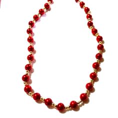 Bright Beautiful Wine Red Pearls Are Matched With Tiny Gold Beads To Make Up This Bold Necklace. The Pearls Are Man Made Cultured Red Pearls That Are 8mm And The Tiny Gold Glass Beads Are 4mm. The Whole Handmade Necklace Is 18" In Size. Classy And Bright This Could Go With So Many Different Outfits. I Hope You Like And Thanks For Stopping By. Feel Free To Leave Me A Fair Offer. :) Adjustable Red Necklace For Holiday, Adjustable Red Beaded Necklace With 8mm Beads, Elegant Red Beaded Necklace For Christmas, Red 8mm Beads Jewelry For Festive Occasion, Red Round Bead Necklaces For Christmas, Red Single Strand Beaded Necklace For Party, Gold Beads Necklace, Dainty Bar Necklace, South Sea Pearl Necklace