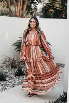 Long Sleeve Bohemian Dress For Fall, Fall Boho Print Hippie Maxi Dress, Fall Hippie Boho Print Maxi Dress, Fall Hippie Maxi Dress With Boho Print, Flowy Boho Print Maxi Dress With Long Sleeves, Orange Bohemian Long Sleeve Maxi Dress, Orange Long Sleeve Bohemian Maxi Dress, Bohemian Orange Maxi Dress For Fall, Hippie Long Sleeve Maxi Dress For Fall