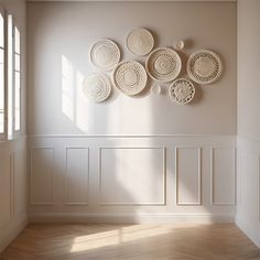 a room with some plates on the wall