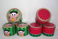 several tins with cartoon characters on them