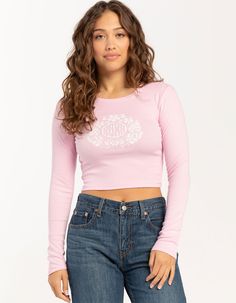 Roxy Monsterra Long Sleeve Crop Tee. Rib Knit Texture. Large Graphic Screened On Front. Ribbed Crew Neckline. Long Sleeves. Cropped Length. 48% Cotton, 48% Polyester, 4% Spandex. Machine Wash. Imported. Model Is Wearing A Size Small Model Measurements:height: 5'7" Bust: 32"waist: 25"hips: 36" Knit Texture, Crop Top Shirts, Top Graphic Tees, Long Sleeve Crop, Crop Tee, Long Sleeve Crop Top, Model Measurements, Infant Tees, Roxy