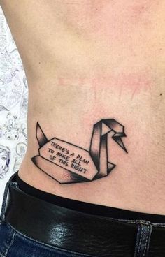 a woman with a tattoo on her stomach that says, there's a plan to make