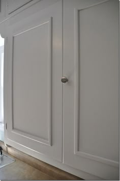 the kitchen cabinets are painted white and ready to be used as counter tops or wall coverings