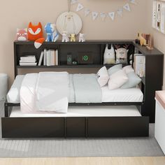 a bed sitting in the middle of a bedroom next to a book shelf