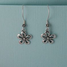 Cute silver plated flower earrings that hang on high quality Sterling silver ear wires. One of my favorite flowers. Comes wrapped ready for gift giving. Hypoallergenic Silver Flower Earrings For Gift, Mother's Day Silver Sterling Flower Earrings, Dangle Flower Earrings As Gift, Dangle Flower Earrings With Ear Wire As A Gift, Nickel Free Dangle Flower Earrings For Gifts, Dangle Flower Earrings With Ear Wire For Mother's Day, Handmade Silver Flower Earrings For Mother's Day, Sterling Silver Flower Earrings For Mother's Day, Mother's Day Silver Handmade Flower Earrings