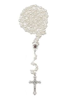 Discover our wide selection of rosaries with relics coming in beautiful gift boxes.Need a large quantity? Then enjoy our promo packs of medals and rosaries. Check them out in our store for a discounted price!★ new Our Lady of Fatima rosary★ 6mm round shaped pearl beads (please note the pearls composing this rosary are not real ones)★ sturdy chain in pewter★ "Tierra de Fatima" relic center medal with soil from Fatima★ italian handmade product★ total lenght (from end of the cross to end of the ros Pearl White Rosary With 8mm Beads As Gift, Spiritual Rosary With Crucifix For First Communion, Pearl White Spiritual Rosary As Gift, White Pearl Rosary As Gift, Spiritual Pearl White Rosary As Gift, Spiritual Rosary For First Communion, White Spiritual Cross Jewelry And Charms, Spiritual Crucifix Rosary For First Communion, First Communion Spiritual Rosary With Crucifix