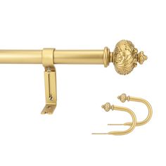 a gold curtain rod with two hooks and a hook on the end, in front of a white background