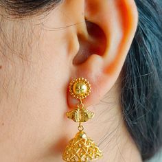 This is a beautiful 22k Real Gold pair of jhumka Earrings .  This is the perfect gift for mom, wife, fiancée, girlfriend, valentine, daughter, family or friend. It is a special gift for mother's day, valentine's day, wedding, anniversary, birthday, Christmas, Easter, New Year's and any holiday. 1. Material Details ✫ Gold : 22K (Real Gold) ✫ Gold Color Options: Yellow Gold ✰ Shape: floral ✰ Color: Yellow ✰ Weight:  10.196 grams approx. Terms & Conditions If there is any change. We request buyer to please inform us before item is shipped. After shipping we cannot accept any changes. Gold Cutdana Danglers For Navratri, Navratri Gold Danglers With Cutdana, Gold Cutdana Bridal Earrings For Navratri, Gold Bollywood Jhumkas For Ceremonial Occasions, Navratri Gold Cutdana Danglers, Gold Chandbalis With Latkans For Navratri, Bollywood Style Gold Jhumkas For Ceremonial Occasions, Gold Jhumkas With Tilla For Navratri, Gold Jhumkas For Navratri Puja