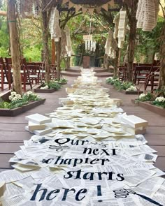 an outdoor ceremony with lots of paper on the ground