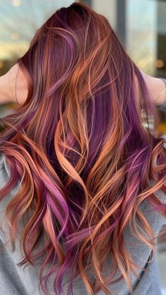 Whatever you decide to wear—that’s all taste and you do you. Fall Bright Hair Color, Purple And Peach Hair, Copper Purple Hair, Vivid Colors Hair, Vivid Hair Color Ideas, Sunrise Hair, Sunset Hair Color, Purple Hair Highlights