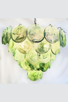 a green chandelier hanging from the ceiling