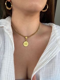 "SPRING SALE                Buy 1 item - Get 10% off                    Buy 2+ items - Get 20% off + Free worldwide shipping ❤ Welcome to My Store ❤ Our unique sun necklace is the hot and trendy thing of the season! This gold pendant necklace can be used as a perfect gift for a trendy woman with a fine style,  In addition, we will package the necklace for you in a festive gift box to complete the experience! ♦ Measurements ♦ Necklace length:  16.3\" + 2\" extension chain / 41.5 cm + 5 cm extensi Trendy Tarnish Resistant Charm Necklaces, Trendy Round Pendant Jewelry, Trendy Gold Jewelry With Sun Design, Gold Charm Necklace With Sun Design, Sun-shaped Necklace For Summer Gifts, Sun Design Charm Necklace Gift, Trendy Sun Design Jewelry, Summer Sun Design Jewelry Gift, Everyday Sun Design Pendant Necklace