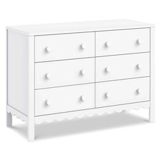 a white dresser with six drawers