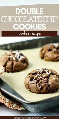 double chocolate chip cookies on a baking sheet with the title text overlay reads double chocolate chip cookies