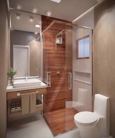 a bathroom with a toilet, sink and glass shower stall in the middle of it