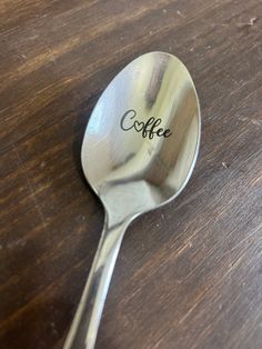 a spoon with the word coffee written on it