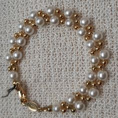 Excellent Condition, 2 Connected Strand Of Faux Perals And Gold Tone Beads, The Black Thread Shows That It Is Nwot. 8". Classic White Pearl Bracelet With Gold Beads, Classic Beaded Pearl Bracelet For Party, Elegant White Bracelet With Gold Beads, Elegant Cream Beaded Bracelets For Parties, Napier Jewelry, Black Thread, Pearl Bracelet, Womens Jewelry Bracelets, The Black