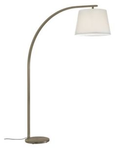 a floor lamp with a white shade on the base and a light bulb attached to it