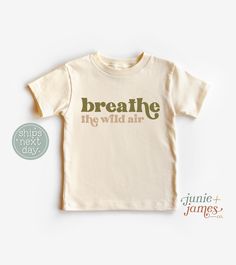 Welcome to Junie +James Co.! All of the designs you see are designed by me, Aubrey, and then handmade & shipped out to you the next business day by my production partner in Upstate New York! It brings me joy to create designs for kids' everyday wear or for those special moments!  Things to know: - Each item is handmade to order! - Please see our size chart below for specs. White bodysuits are Gerber Onesies® Brand. Natural bodysuits and toddler/youth shirt brands may vary depending on availabili Organic Cotton Pre-shrunk Short Sleeve Tops, Pre-shrunk Organic Cotton Short Sleeve Shirt, Unisex Organic Cotton T-shirt For Summer, Unisex Custom Print Shirt For Summer, Unisex Custom Print T-shirt For Summer, Unisex Text Print Shirt For Summer, Summer Unisex Text Print Shirt, Summer Text Print Shirt, Relaxed Fit Organic Cotton Tops With Custom Print