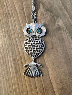 "Vintage Blue Eyed Owl Necklace on a 22\" silver chain approximately 4\" long and 1.5\" across - silver with teal blue eyes You will receive this in a jewelry box for gifting B-1 To see more vintage jewelry (free shipping when you order $30 or more from my shop):  https://www.etsy.com/shop/BuffaloPlaidVintage?ref=seller-platform-mcnav&section_id=23319946 To see more Buffalo Plaid Vintage listings, click here: https://www.etsy.com/shop/buffaloplaidvintage New to Etsy? To navigate, search within the shop (top right) or select a section (left side). Happy shopping!" Retro Sterling Silver Jewelry Gift, Retro Sterling Silver Jewelry For Gift, Handmade Retro Silver Jewelry, Retro Long Necklace As Gift, Owl Necklace, Blue Eyed, Shop Top, Buffalo Plaid, Free Jewelry