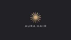 the logo for aura hair is shown in gold and black with a sunburst on it