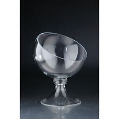 a glass bowl sitting on top of a table