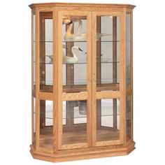 a wooden display case with glass doors and two swans on the front, one bird in it