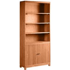 a wooden bookcase with two doors and one drawer on the bottom, against a white background